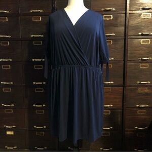 Beautiful knee length navy wrap dress